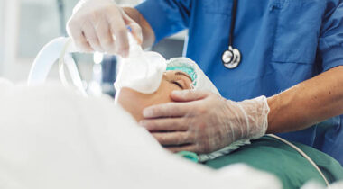 Anesthetic nurses in operation room at hospital with patient
