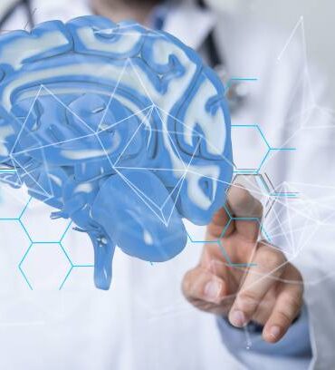 A businessman hand using 3D rendering globe network brain hologram